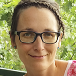 žena